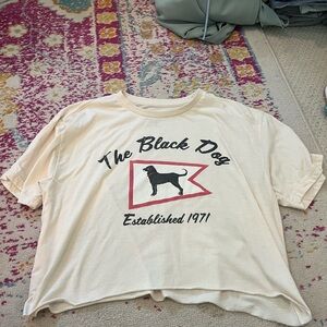 The Black Dog Cream and Black Apparel